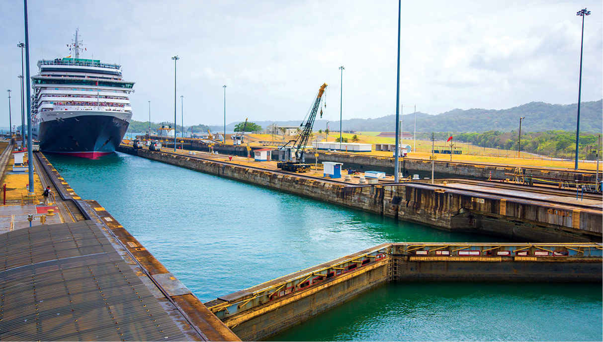 As ships pass through the Panama Canal they are lifted or lowered around - photo 17