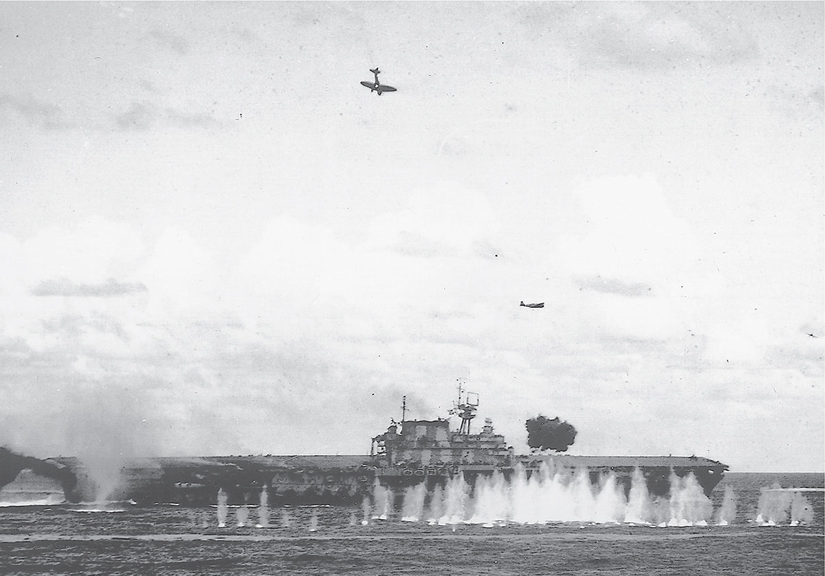 A Zuikaku D3A1 Val dive-bomber that was hit by antiaircraft fire is seen here - photo 4