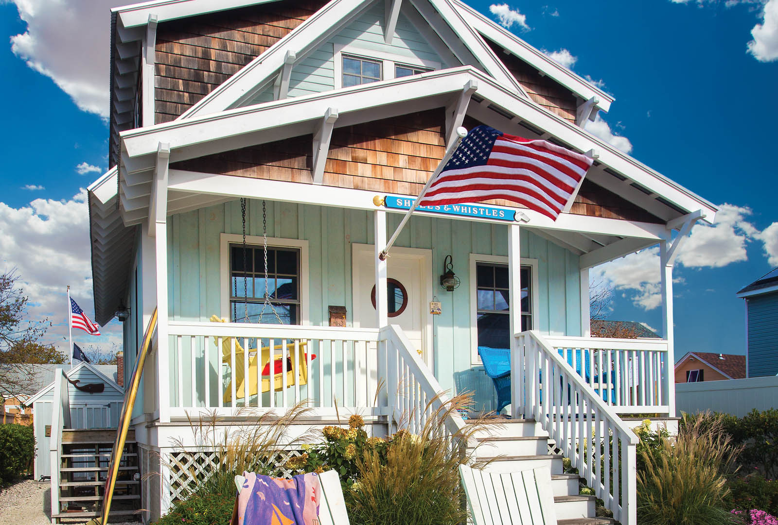 With its generous broad porch painted board-and-batten walls and the low - photo 7