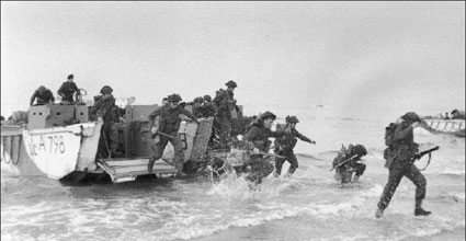 Infantry storm ashore from landing craft during an exercise in early 1944 - photo 1