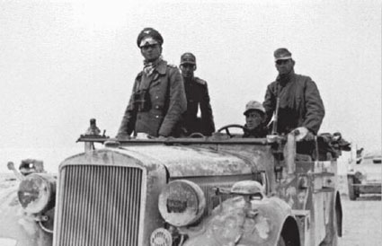 25 November 1941 and a tired and dispirited Rommel stands in the front of his - photo 3