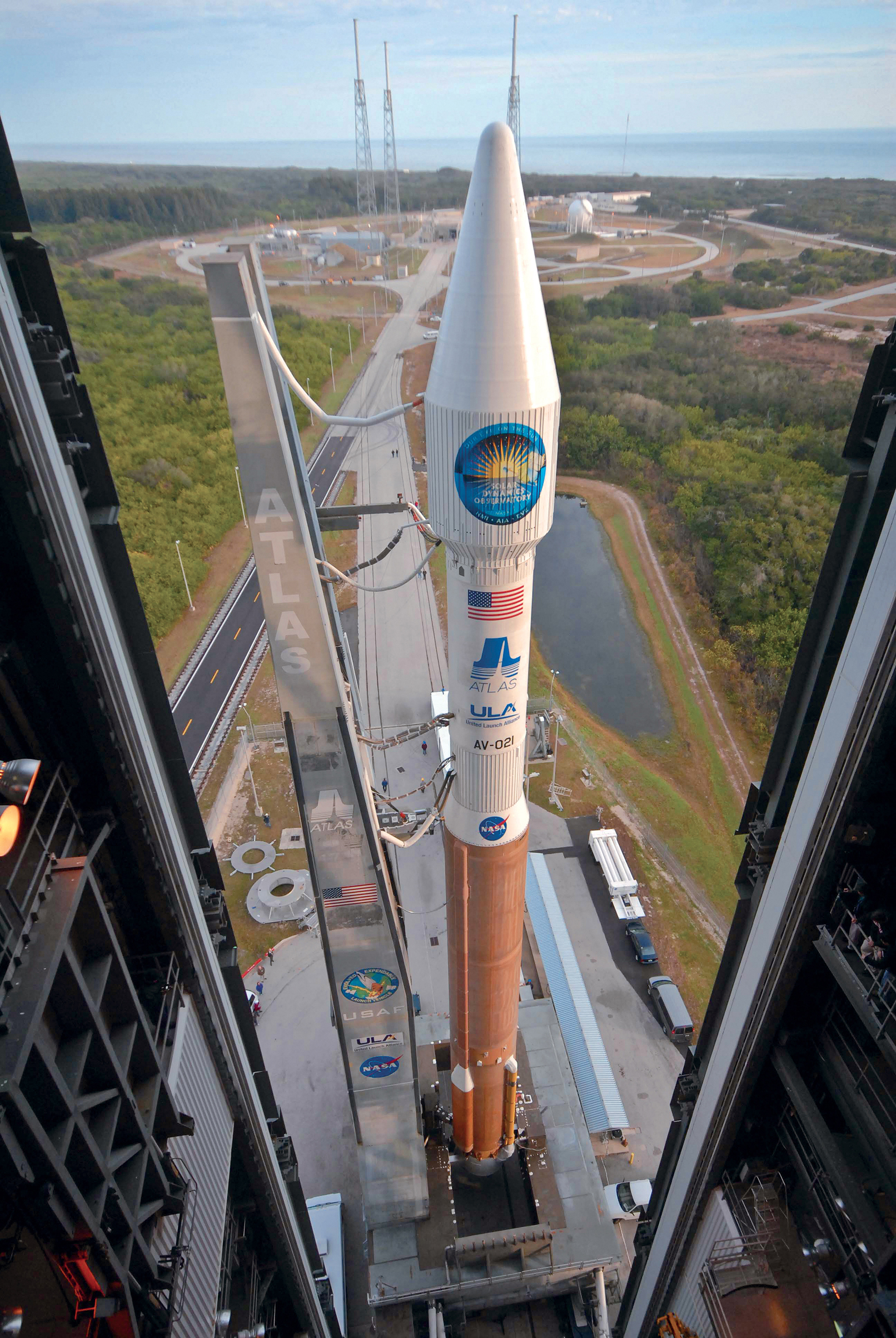 The Atlas V rocket carrying the Solar Dynamics Observatory begins rolling out - photo 3