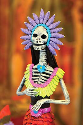 Dia de los Muertos figurine Sedona city sign kayaking in the desert On - photo 9