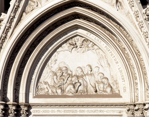 Bas-relief above the central entrance of the church The suffering souls in - photo 5