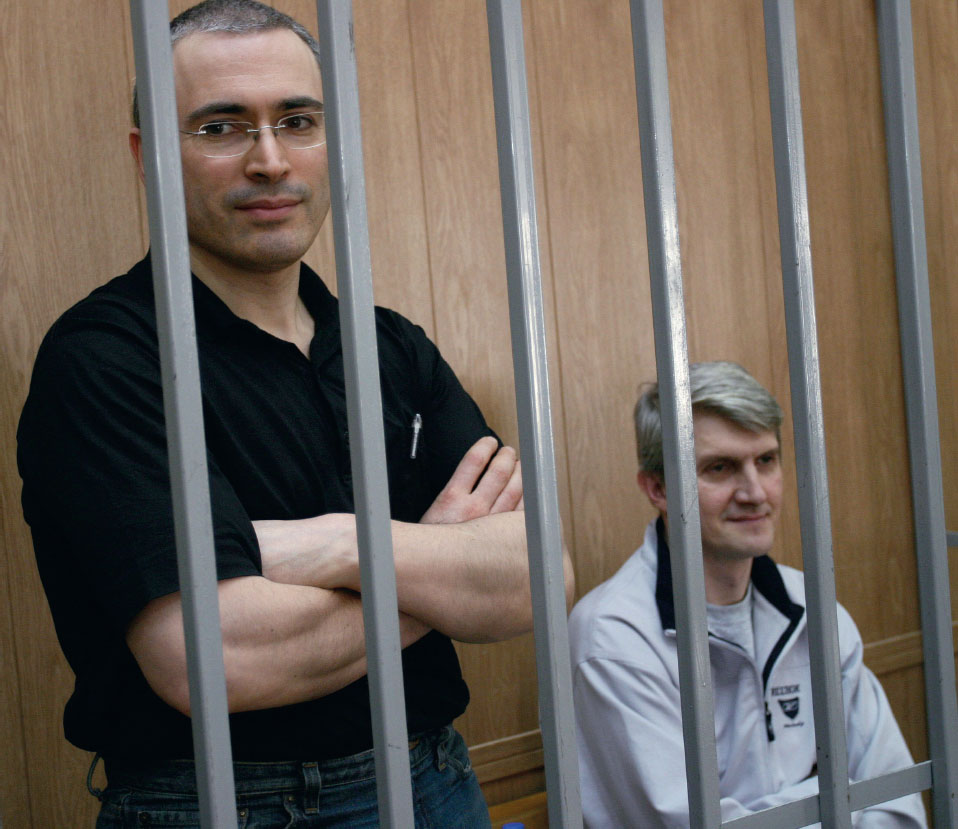 Russias one-time richest man Mikhail Khodorkovsky left and his closest - photo 13