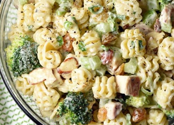 This pasta salad topped with bright green broccoli florets and sun-dried - photo 10