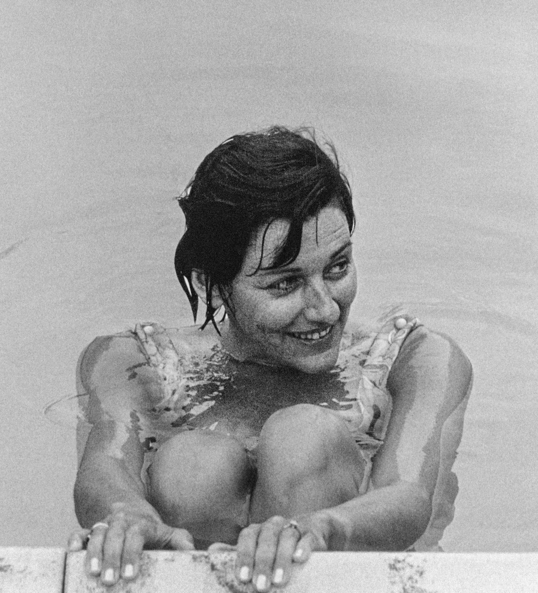 Anne Sexton in her swimming pool in the 1960s Poetry usually followed her - photo 3