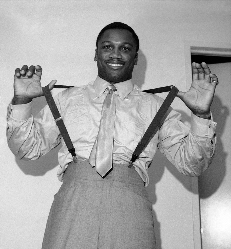 Joe Frazier 1968 AP Images H is straw fedora tipped at a jaunty angle Joe - photo 1