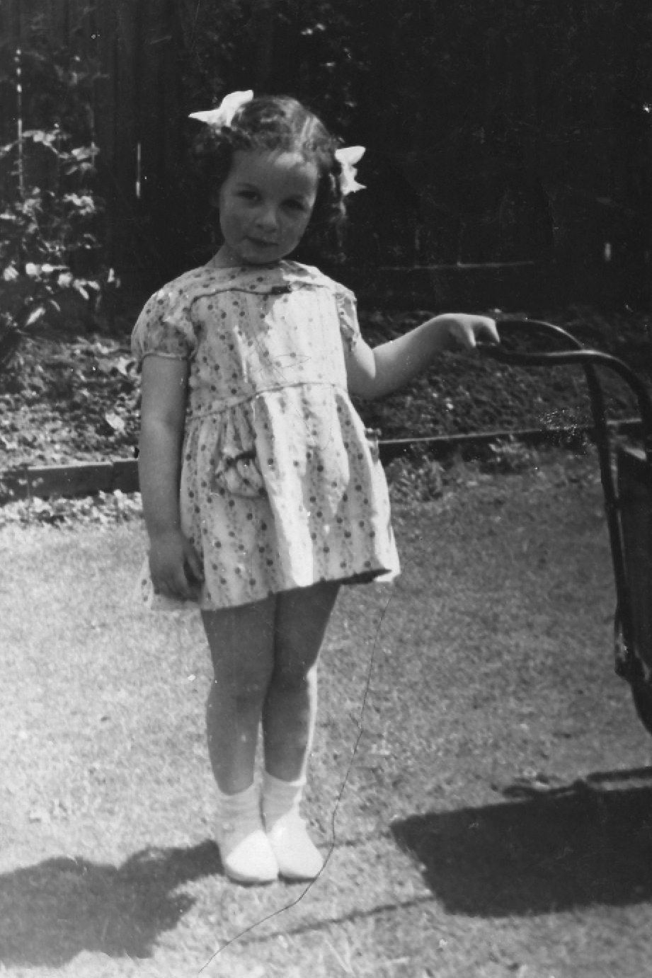 1943 I am four years old and as you can see in the picture I am wearing my - photo 3