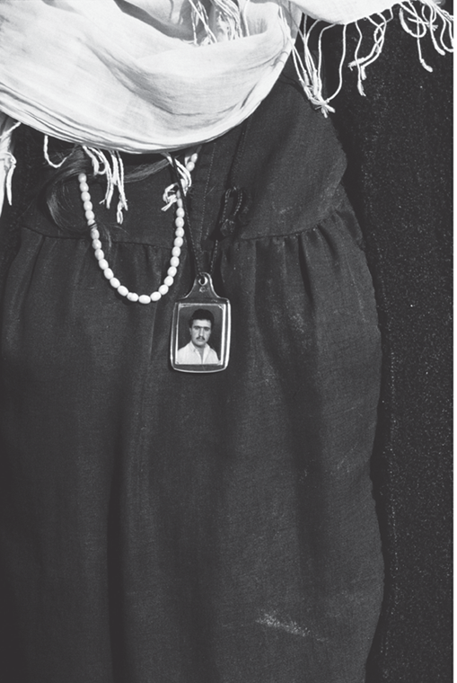 Susan Meiselas Family members wear the photographs of Peshmerga martyrs - photo 2