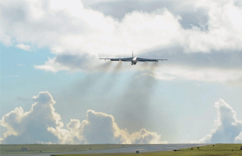 A B-52H from the 96th Expeditionary Bombardment Squadron takes off from - photo 13