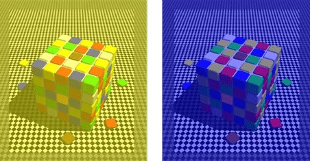 The blue tiles on the top face of the left cube are the same color as the - photo 1
