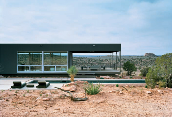 The main axis of this vacation home runs along a rocky hillside providing - photo 8