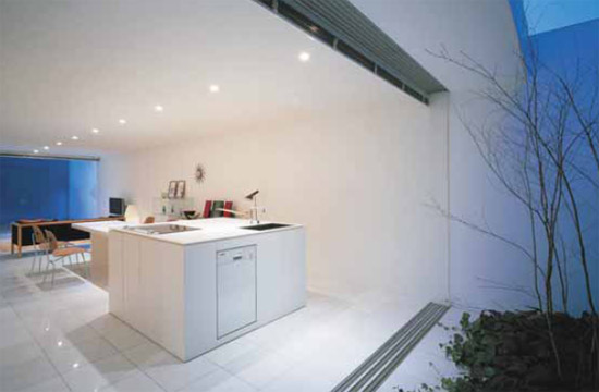 The kitchen seen from the rear courtyard adjoining it continues the theme of - photo 3