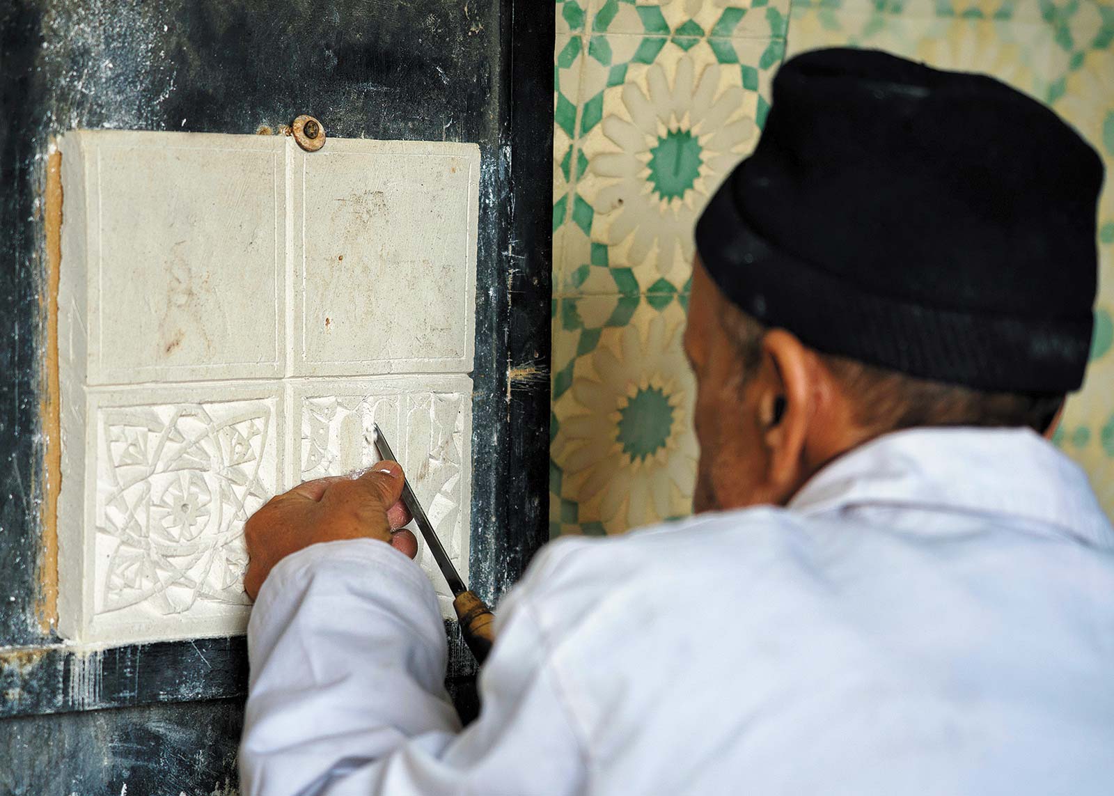 artisan chiseling stucco in Marrakesh In the valleys and plains youll find the - photo 11