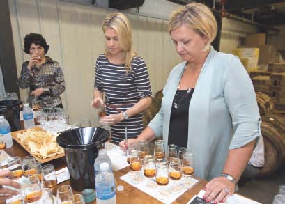 A panel from Bourbon Women tasting samples for a private bottling at Four - photo 4