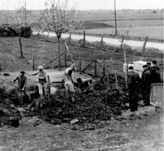 The victims of the massacre were exhumed in May 1942 and transferred to the - photo 12