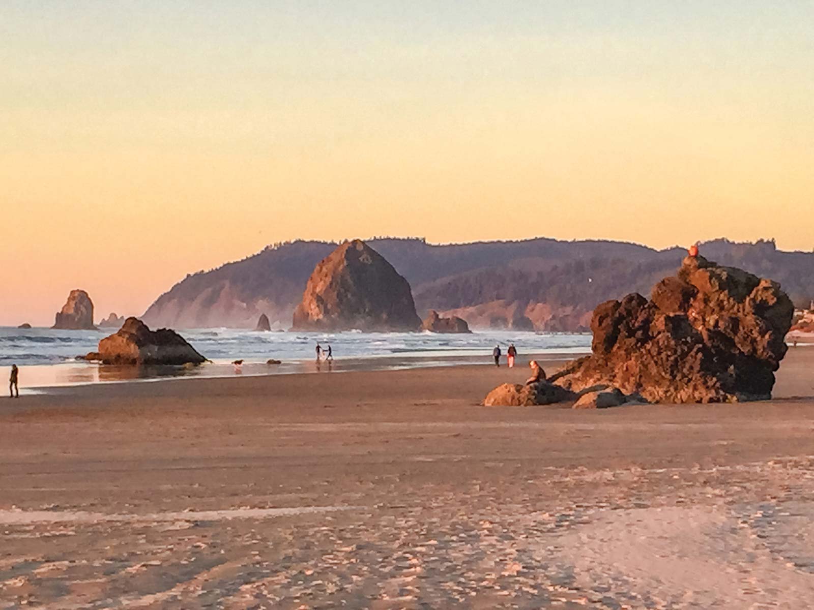 Cannon Beach In few other places on earth is the meeting of land and sea as - photo 7