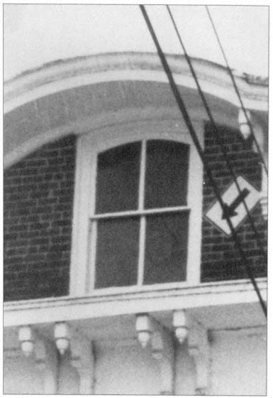 The face in the window of the Pickens County Courthouse in Carrollton is - photo 2