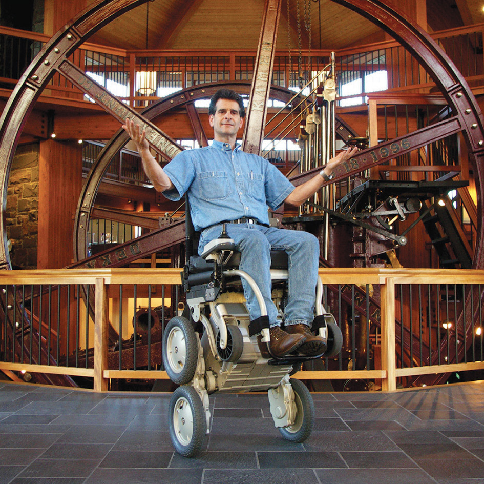 Inventor Dean Kamen demonstrating the iBot a Transformer-like wheelchair that - photo 5