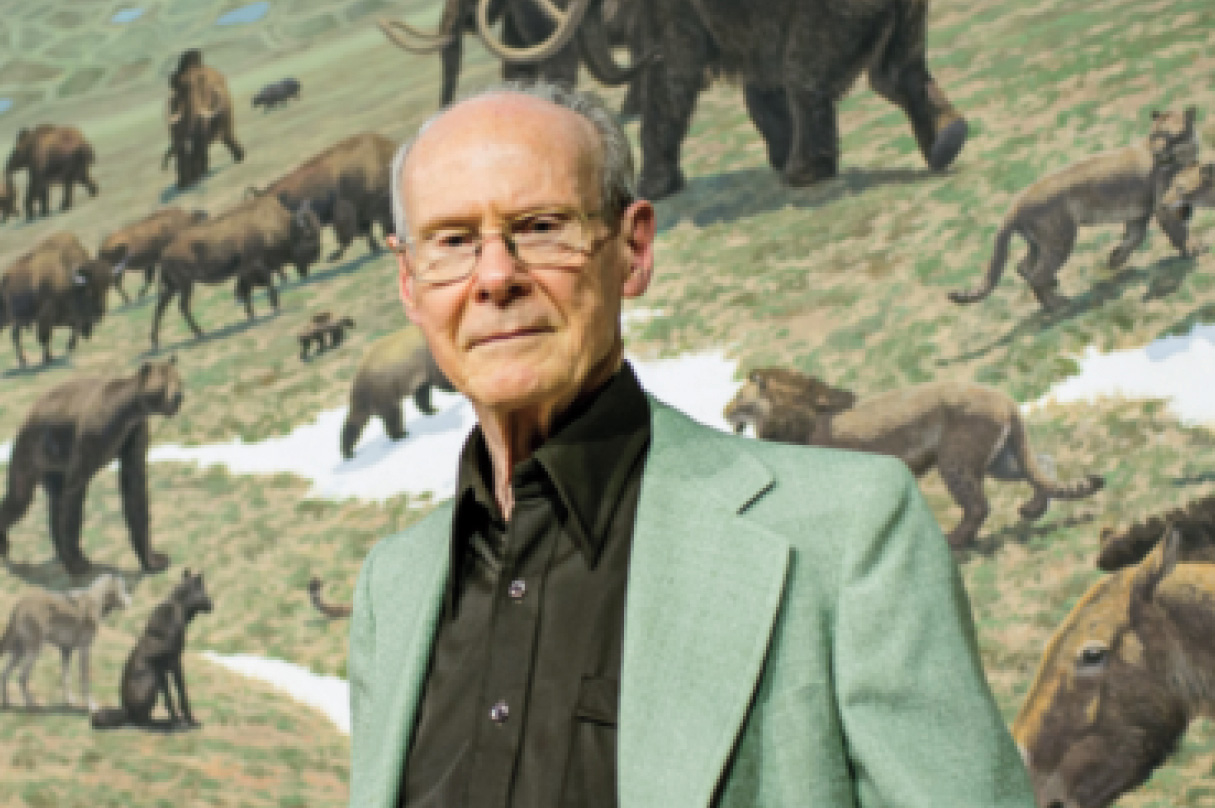 Jay Matternes stands in front of his late Pleistocene mural just before its - photo 6