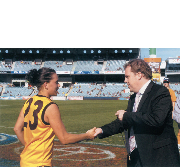 Early champion of womens footy David Matthews meets Kirby before a state game - photo 9