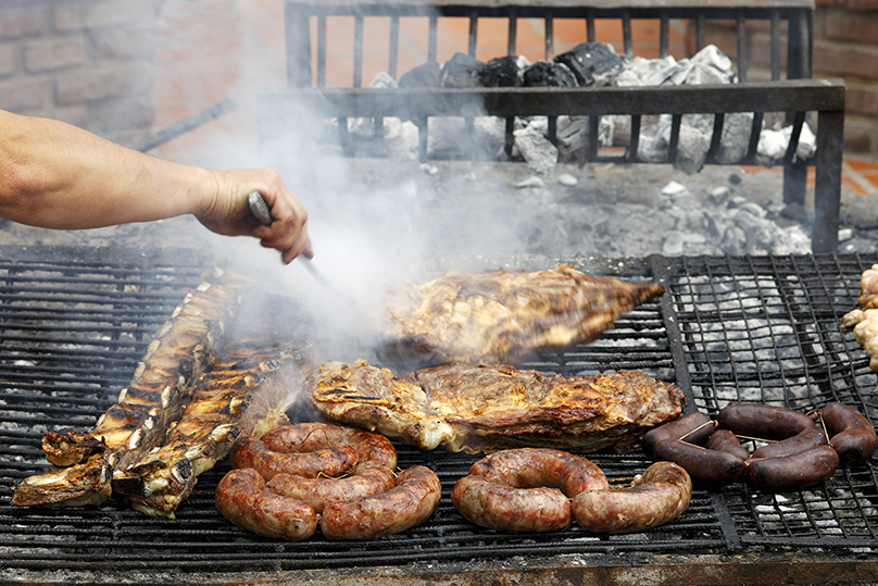 Meat cooking on a parrilla grill ROCHARIBEIROSHUTTERSTOCK Art - photo 7