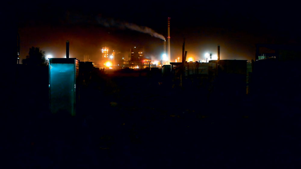 Day and night View from the informal settlement Nkaneng looking onto Lonmins - photo 3