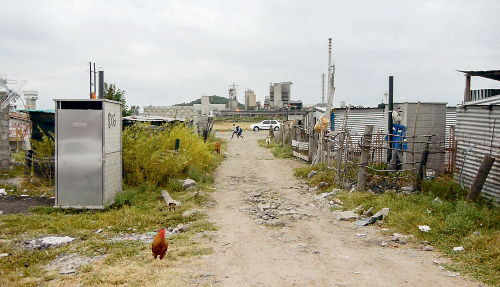 Day and night View from the informal settlement Nkaneng looking onto Lonmins - photo 4
