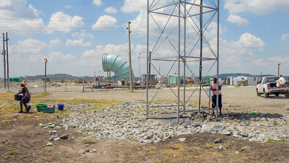 Water is supplied to the informal settlements around Marikana through water - photo 5