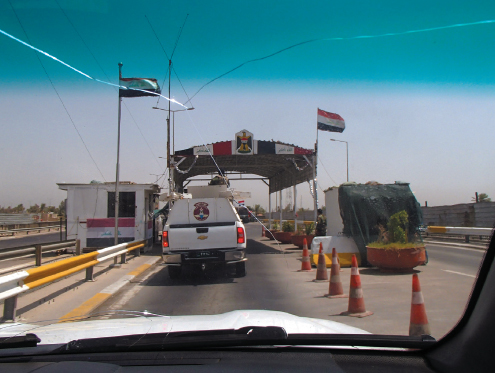 Our convoy stopped at one of the military checkpoints on the road from the - photo 5