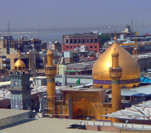 The golden dome and minarets of the Imam Ali Mosque in Najaf widely considered - photo 23