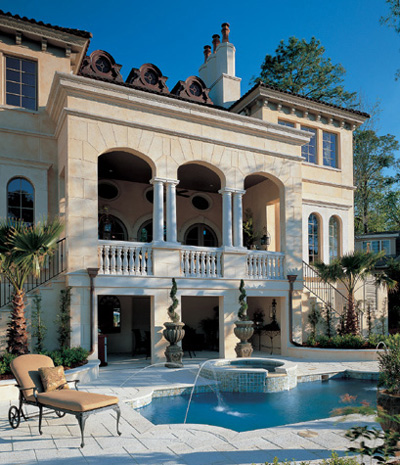 A paved courtyard and reflecting pool with a fountain adorn the grand entrance - photo 7