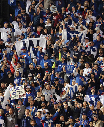 Fans fly the W following the Cubs NLCS Game 6 victory Steve LundyDaily - photo 7