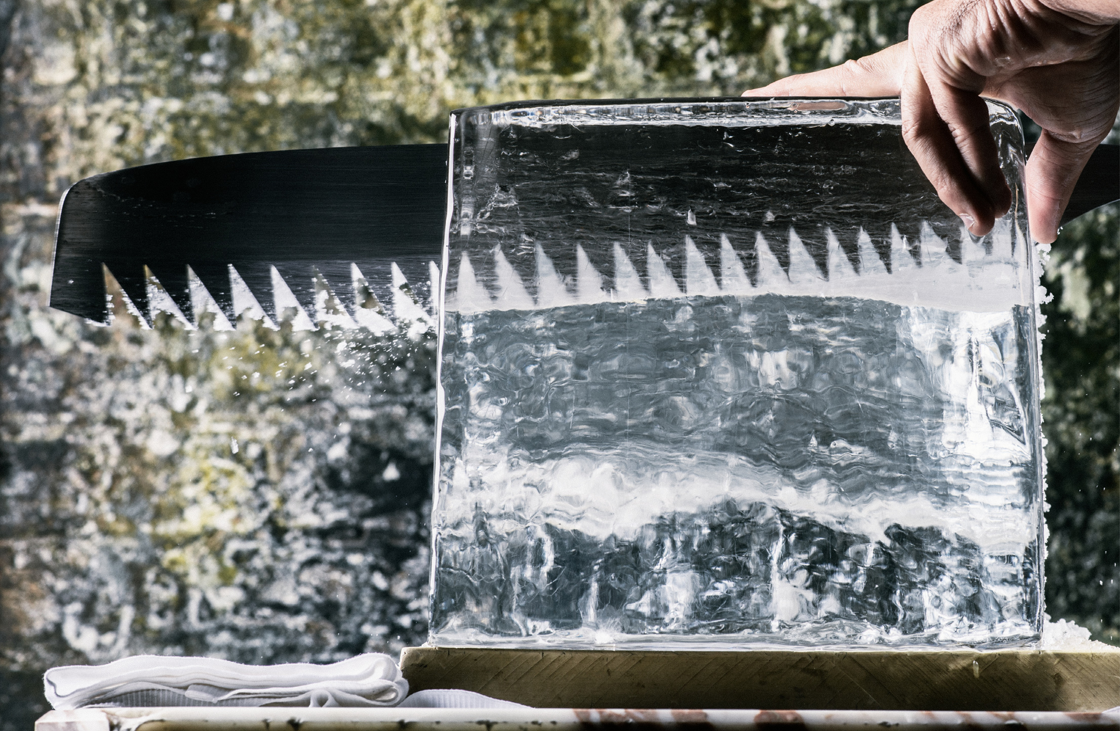 A fifty-pound block of ice frozen slowly from distilled water Hewn with a - photo 8