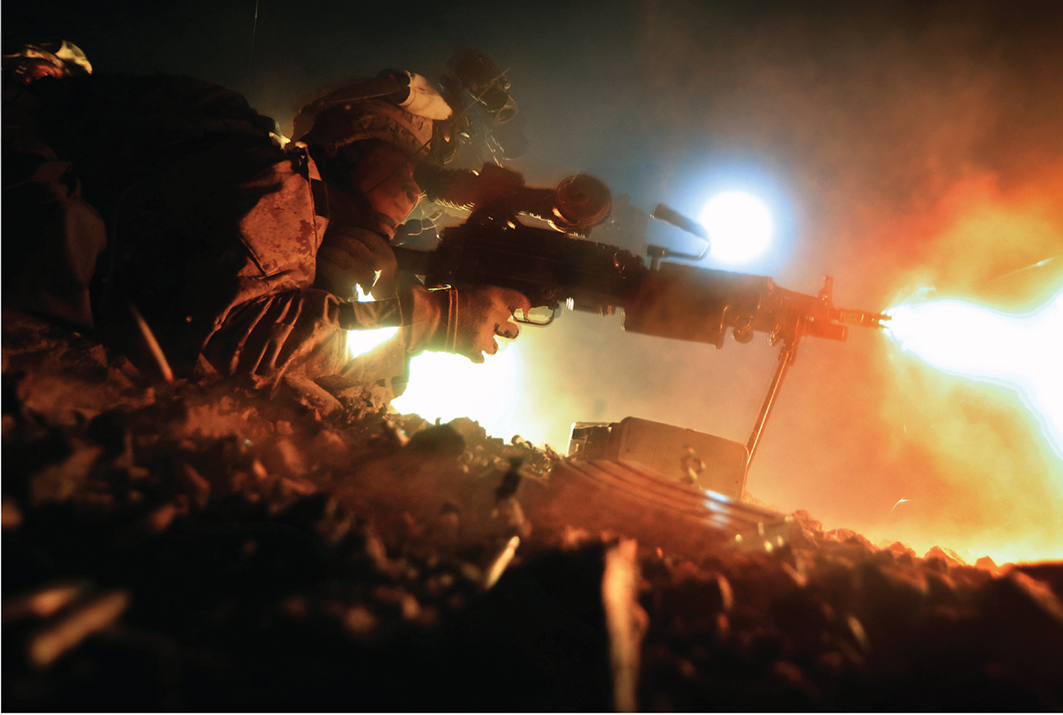 A machine-gunner with Company E Battalion Landing Team 24 fires an M249 SAW - photo 4