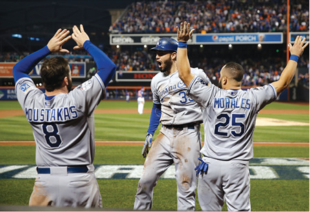 Eric Hosmer center Mike Moustakas and Kendrys Morales are pumped after the - photo 5