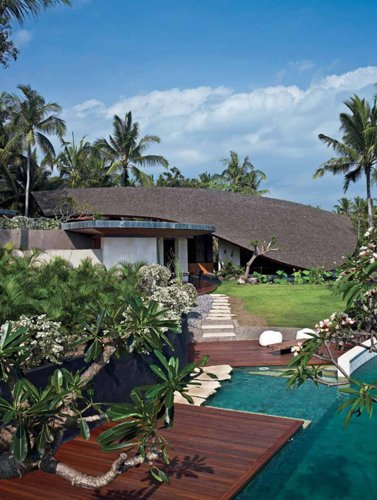 This modern holiday home built in a verdant rice field seting employs a - photo 4