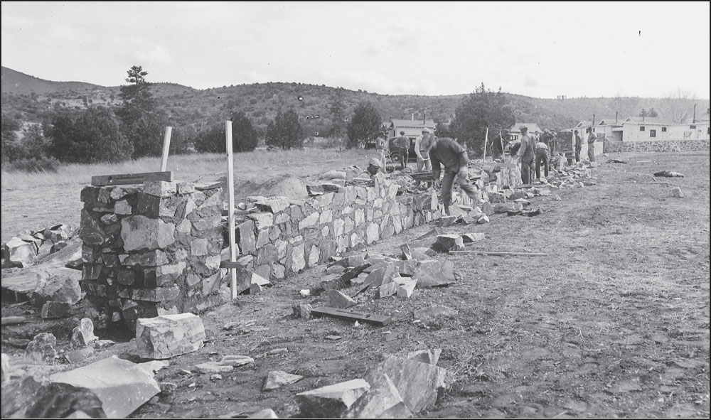 Workers construct a rock wall around Citizens Cemetery in 1934 This was part - photo 5