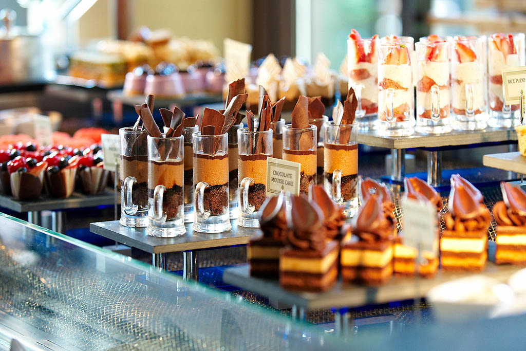 Selection of desserts on display at Al Qasr Hotel BRIAN BJELDBAK ALAMY - photo 14