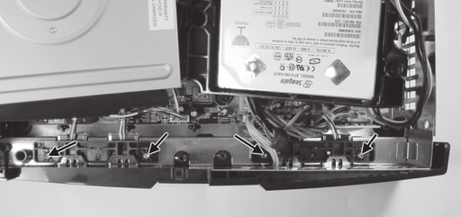 Figure 3-2 Location of the four retaining screws on the front panel assembly - photo 4