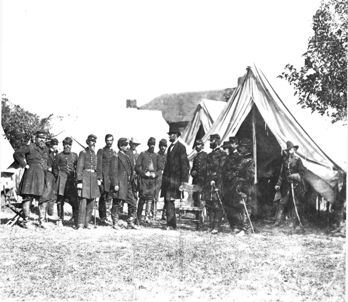 Wearing his familiar stovepipe hat Lincoln towers above General George B - photo 4