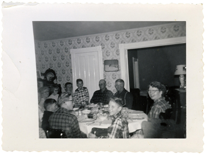 A large group gathered around the Apps dining room table for Thanksgiving - photo 5