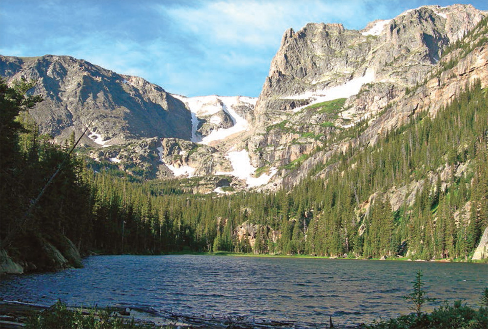 Notchtop Mountain rises above Odessa Lake in Rocky Mountain National Park - photo 3