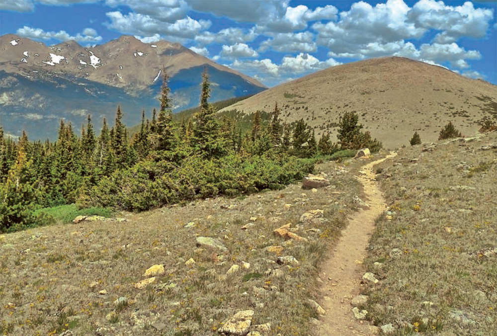 The mountains of the Continental Divide including the flat top of Longs Peak - photo 12