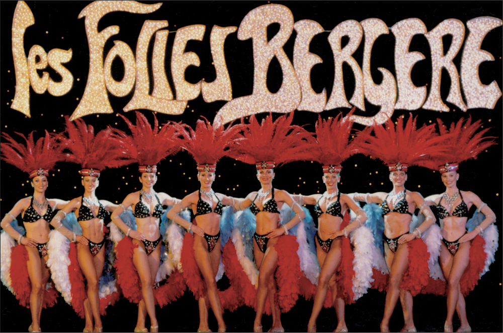 In this photograph a line of costumed showgirls pose with the iconic les - photo 2