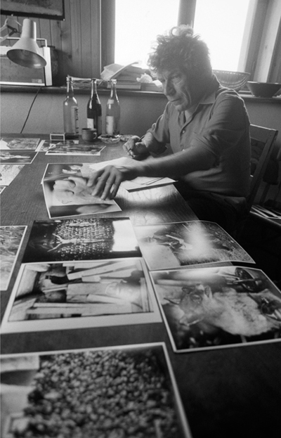 John Berger 1980 looking at Jean Mohrs photographs with him to make a - photo 3