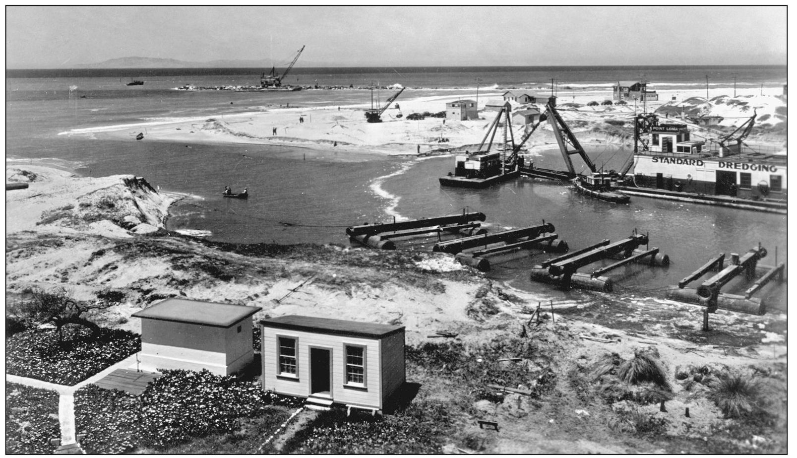 By May 1939 the Standard Dredging Company broke through the sand dunes and - photo 14