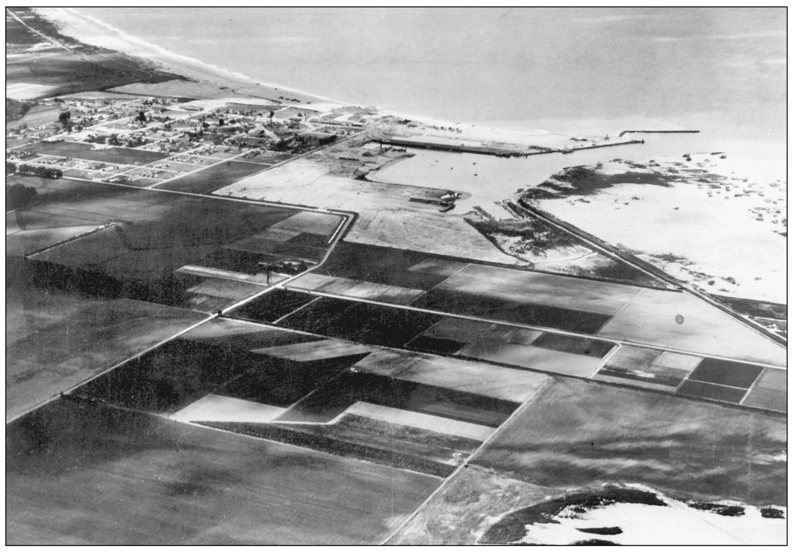 This February 1942 aerial photograph of the new port was taken by the Bureau of - photo 15