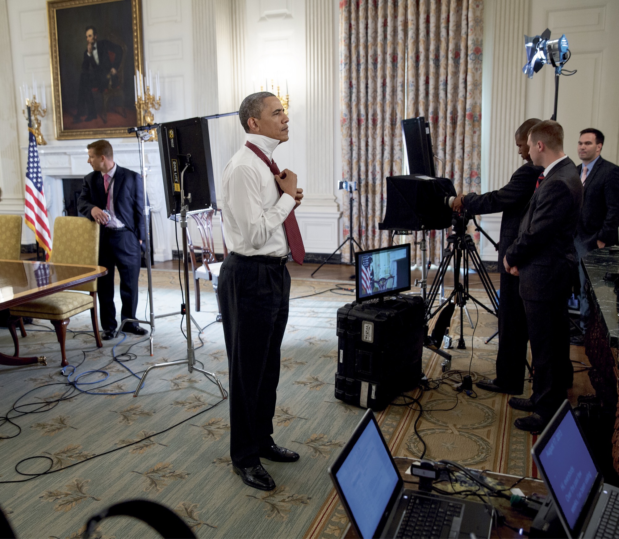 President Obama with White House Communications Agency staffers all around - photo 5